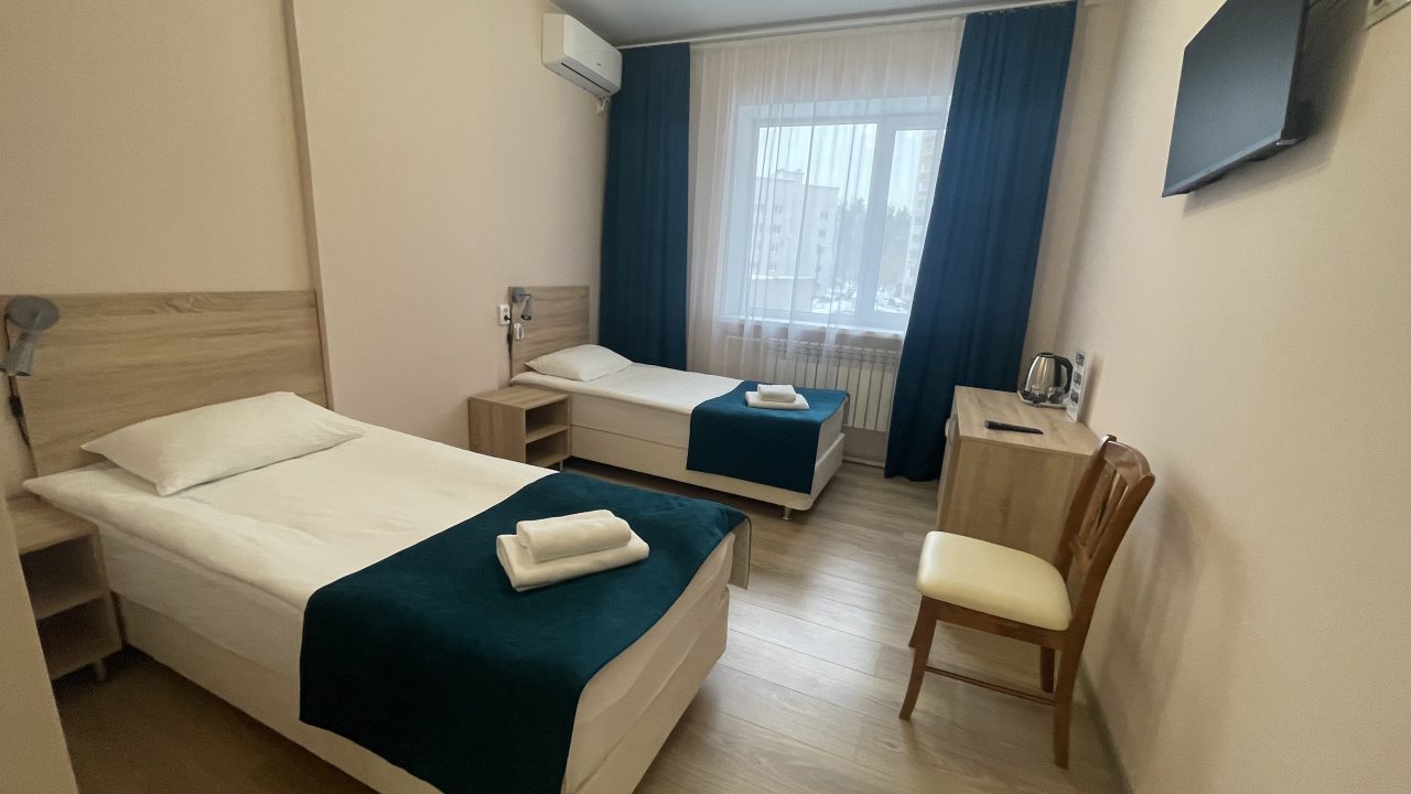 Двухместный (Улучшенный (после ремонта) TWIN с двумя раздельными кроватями) отеля Норд, Воронеж