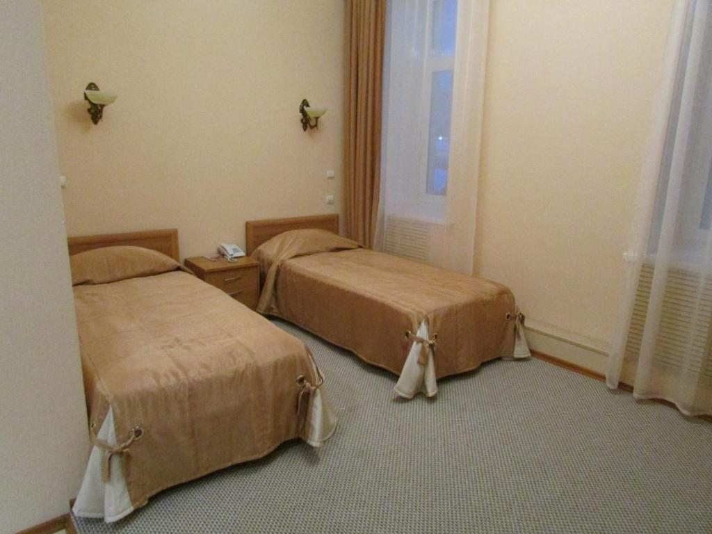 Двухместный (Двухместный номер с 2 отдельными кроватями) отеля Академия, Курган