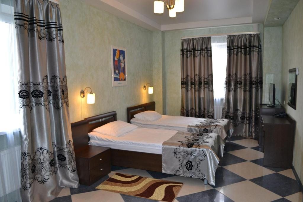 Двухместный (Стандартный двухместный номер с 2 отдельными кроватями) отеля Владимир-Плаза, Брянск