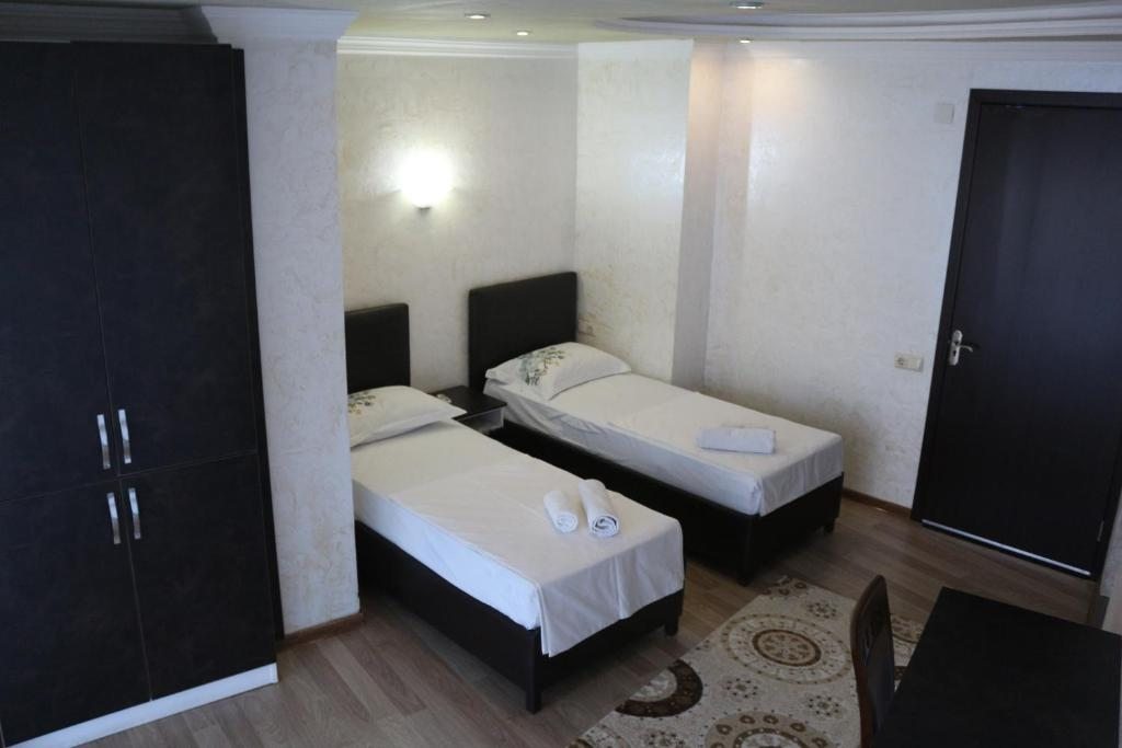Двухместный (Двухместный номер с 2 отдельными кроватями) отеля Roof, Батуми