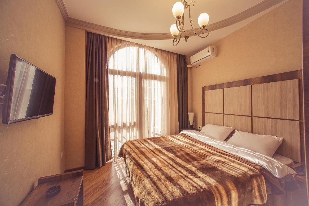 Двухместный (Стандартный двухместный номер с 1 кроватью или 2 отдельными кроватями) отеля Royal Venezia Hotel, Батуми