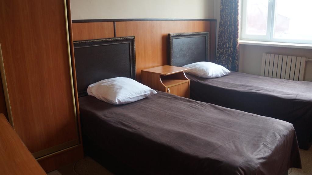 Двухместный (Улучшенный двухместный номер с 2 отдельными кроватями) отеля Фламинго, Хасавюрт