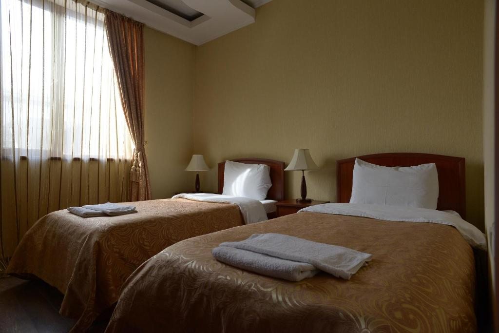 Двухместный (Стандартный двухместный номер с 2 отдельными кроватями) отеля Aeetes Palace Hotel, Кутаиси