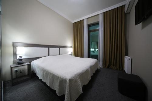 Двухместный (Стандартный двухместный номер с 1 кроватью или 2 отдельными кроватями) отеля Дисковери, Кутаиси