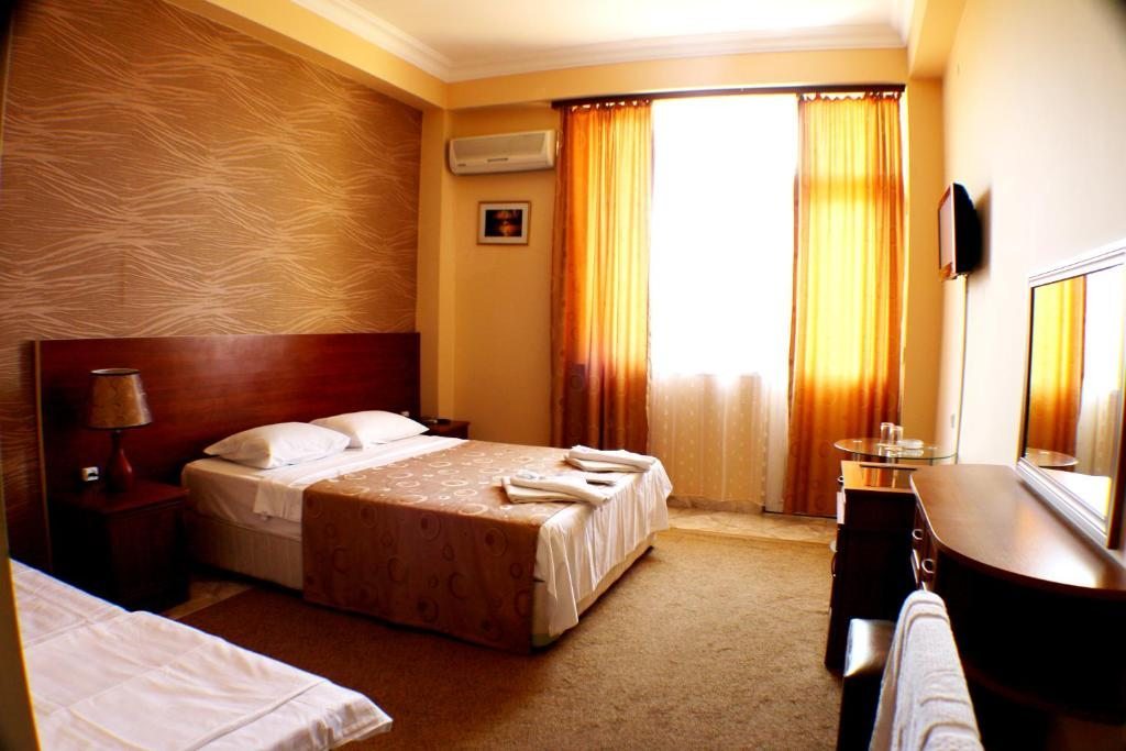 Двухместный (Двухместный номер Делюкс с 1 кроватью и дополнительной кроватью) отеля Condori, Кобулети