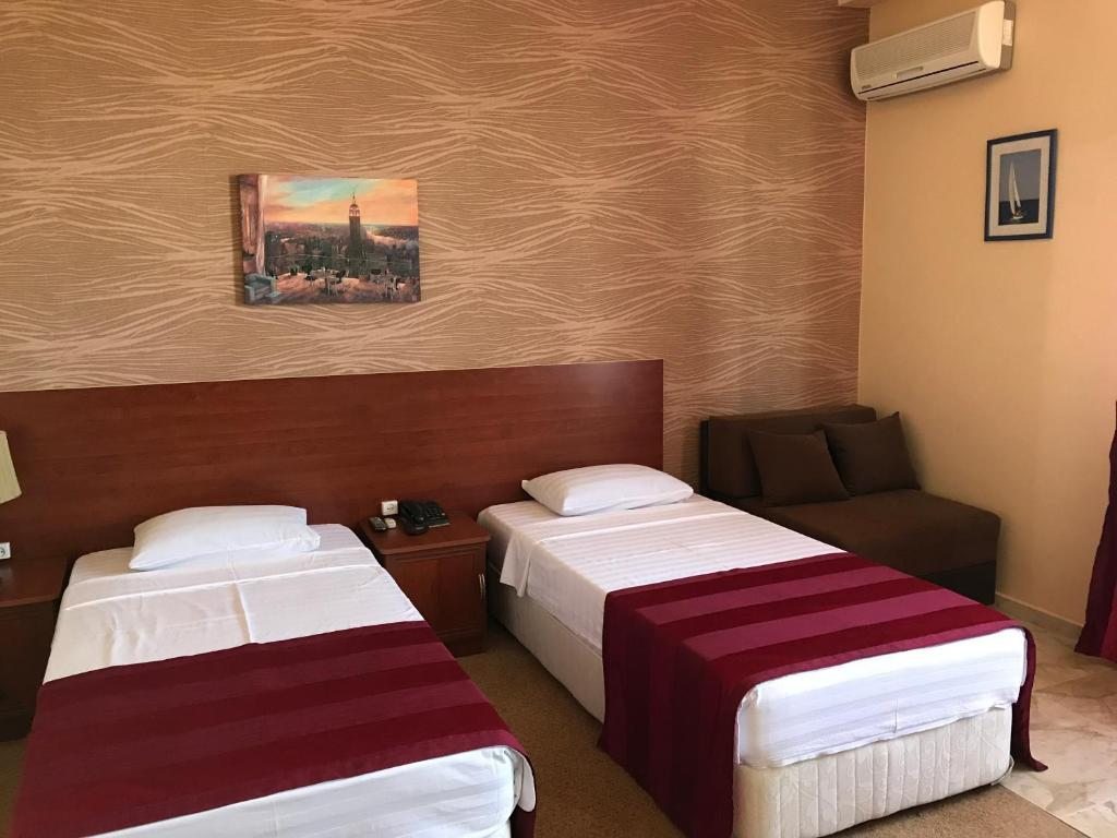 Двухместный (Двухместный номер с 2 отдельными кроватями и дополнительной кроватью) отеля Condori, Кобулети