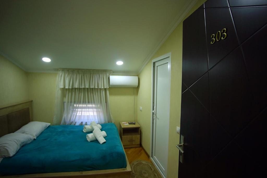Двухместный (Двухместный номер с 2 отдельными кроватями и ванной) семейного отеля На Шартава 15, Кутаиси