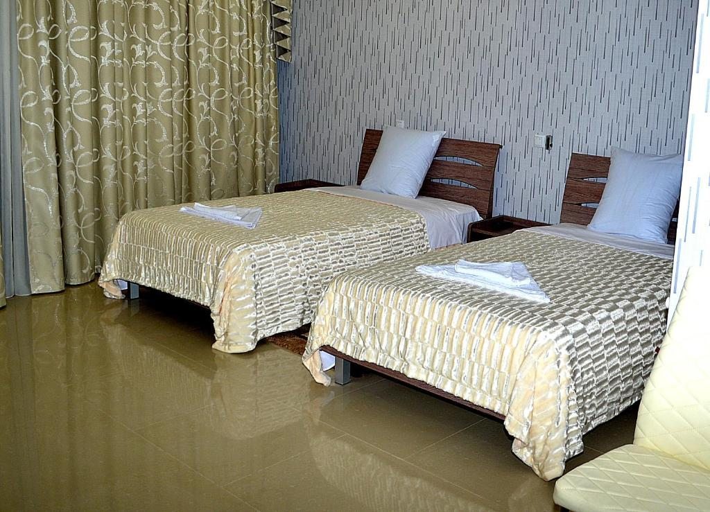 Двухместный (Двухместный номер Делюкс с 2 отдельными кроватями) отеля Okriba, Кутаиси