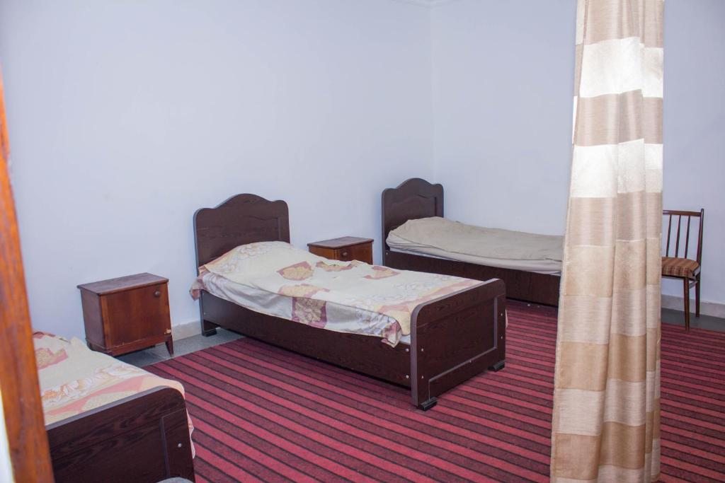 Номер (Односпальная кровать в общем номере) гостевого дома Имери, Кутаиси