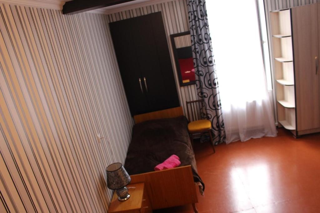 Четырехместный (Четырехместный номер с собственной ванной комнатой) гостевого дома Anano, Боржоми