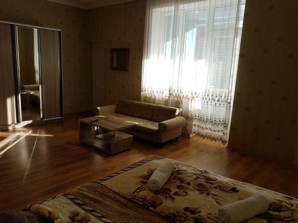 Двухместный (Двухместный номер с 1 кроватью или 2 отдельными кроватями и балконом) отеля Lasha-Giorgi, Бакуриани