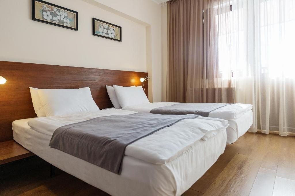 Двухместный (Двухместный номер с 1 кроватью или 2 отдельными кроватями и балконом) отеля Monte, Гудаури