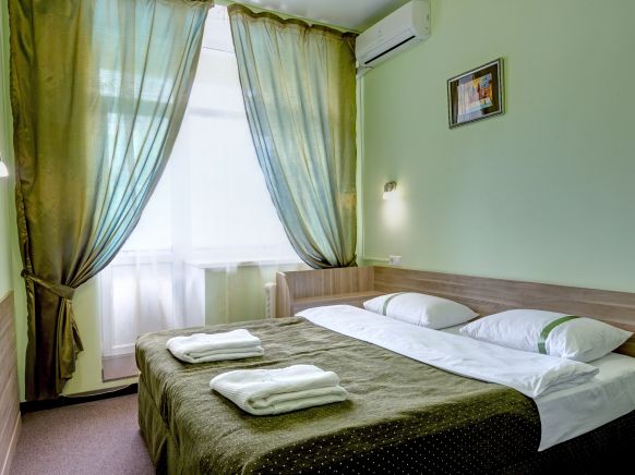 Фотография номера гостиницы Тан