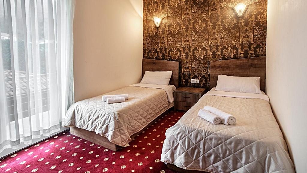 Двухместный (Стандартный двухместный номер с 2 отдельными кроватями) отеля Orange Hotel, Гонио