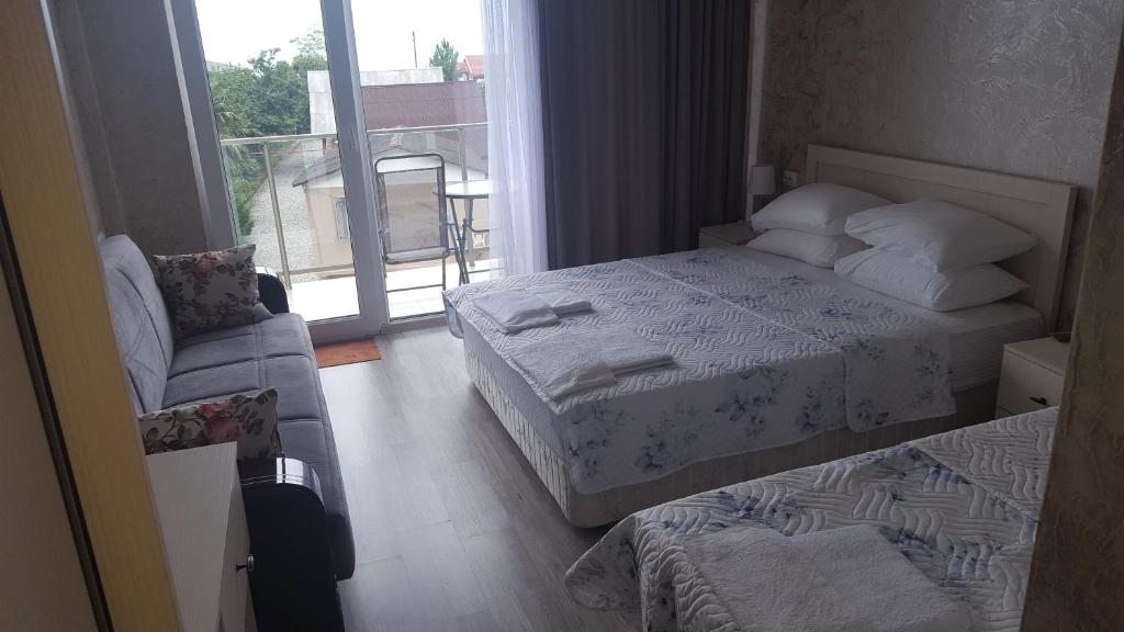 Двухместный (Улучшенный двухместный номер с 2 отдельными кроватями и видом на море) отеля Del Mar, Квариати