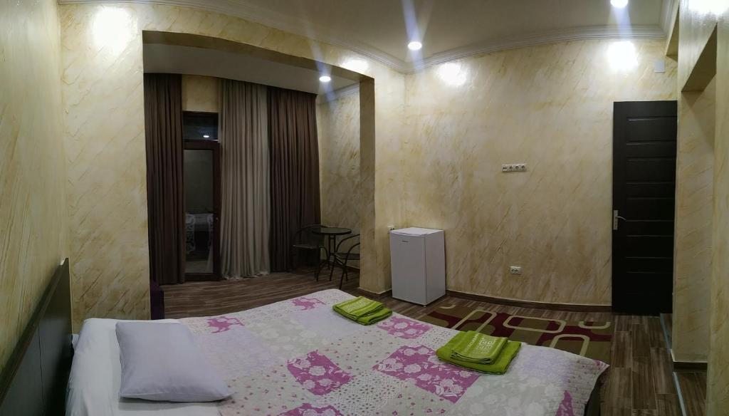 Двухместный (Двухместный номер Делюкс с 1 кроватью и балконом, вид на море) семейного отеля Batumi Homestay, Махинджаури