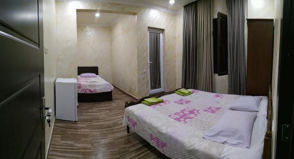 Трехместный (Трехместный номер с собственной ванной комнатой) семейного отеля Batumi Homestay, Махинджаури