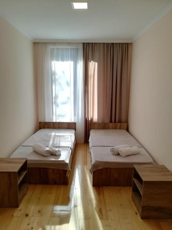 Двухместный (Двухместный номер с 2 отдельными кроватями и ванной комнатой) гостевого дома Eka's, Местиа