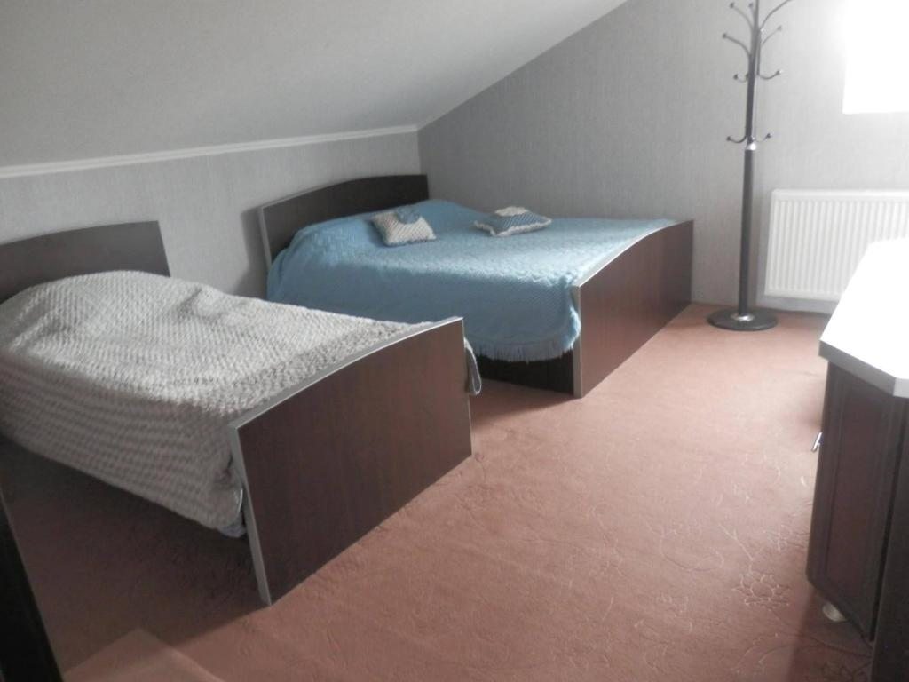 Двухместный (Двухместный номер с 2 отдельными кроватями и ванной комнатой) отеля Нели Телави