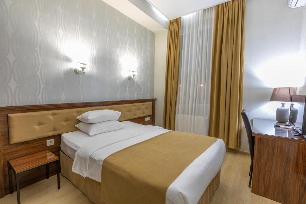 Двухместный (Стандартный двухместный номер с 2 отдельными кроватями) курортного отеля Цхалтубо на Палиашвили