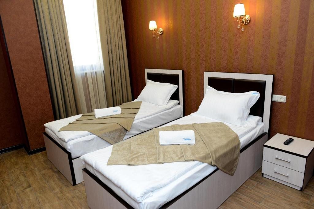 Двухместный (Стандартный номер с 2 односпальными кроватями и диваном) отеля Эридана, Ереван