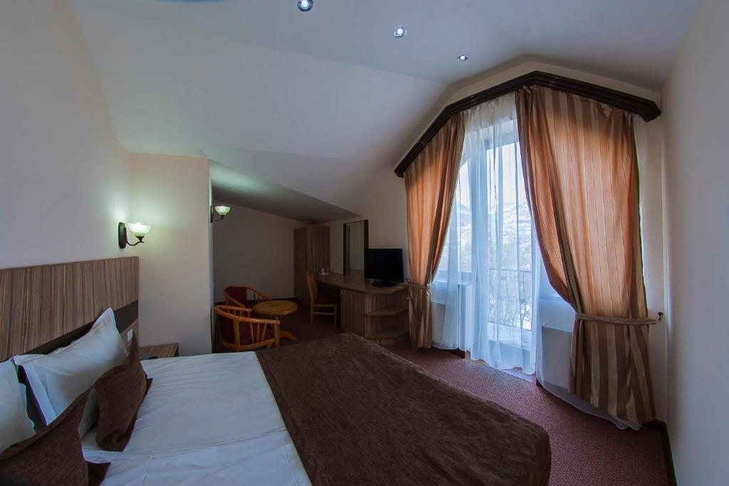 Двухместный (Стандартный двухместный номер с 1 кроватью или 2 отдельными кроватями) отеля Альпина, Цахкадзор