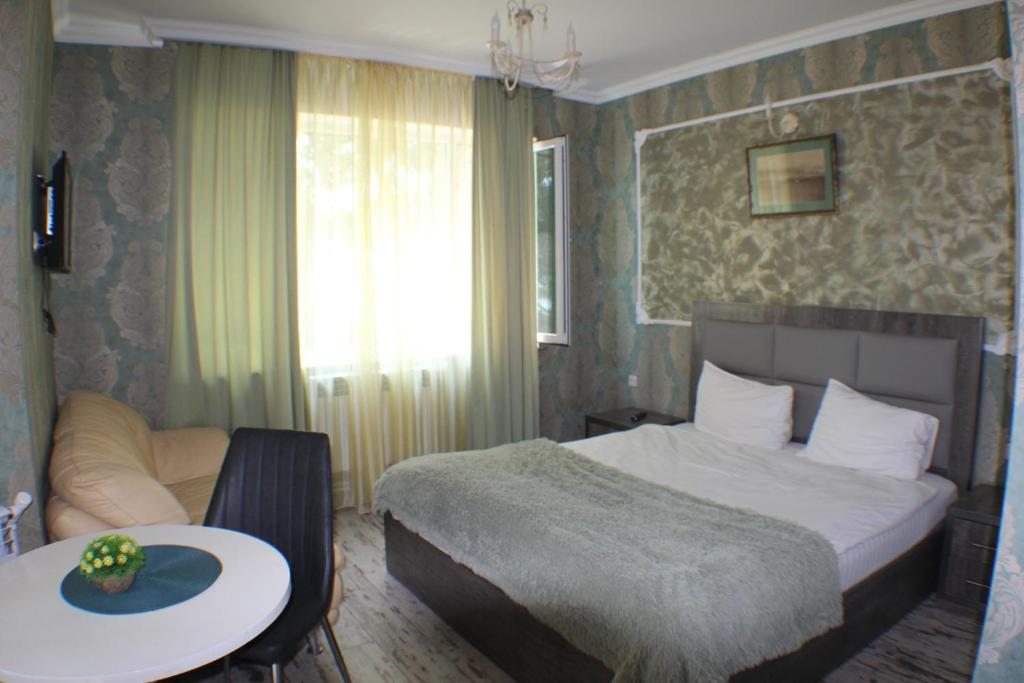 Двухместный (Двухместный номер Делюкс с 1 кроватью (для 1 взрослого и 1 ребенка)) отеля Камбуз, Севан