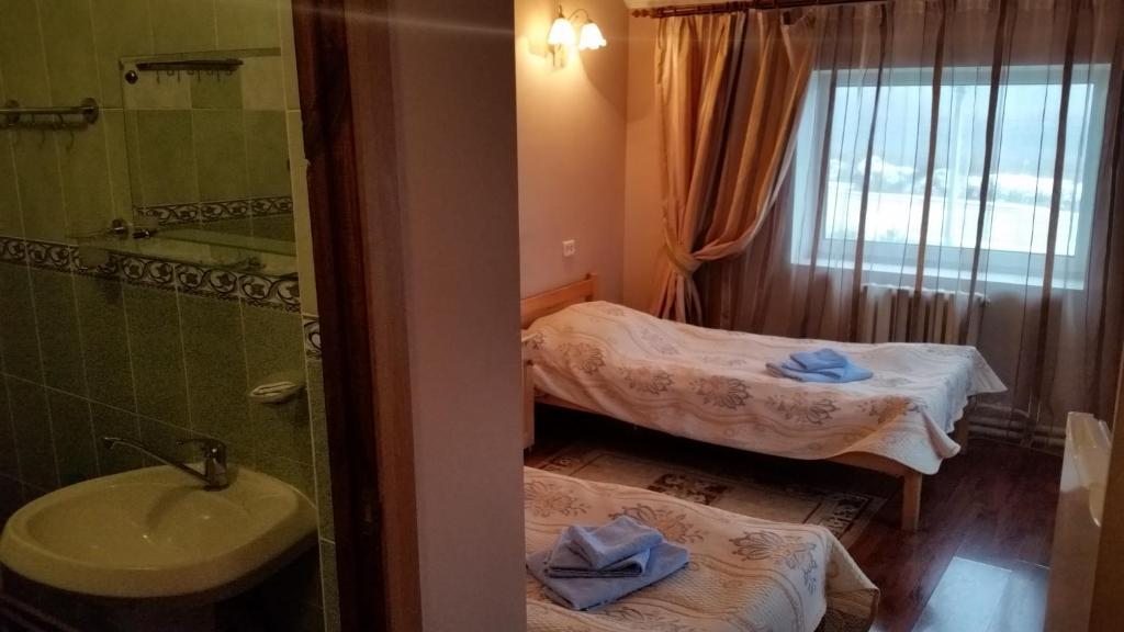 Двухместный (Двухместный номер с 2 отдельными кроватями и ванной) отеля Алирико, Кузяево