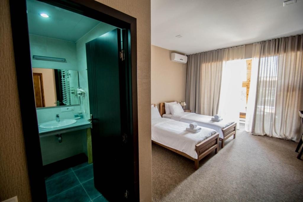 Двухместный (Двухместный номер Делюкс с 1 кроватью или 2 отдельными кроватями) отеля Шато Кварели