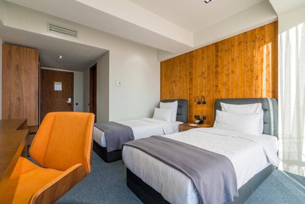 Двухместный (Двухместный номер с 2 отдельными кроватями, вид на сад) отеля Kvareli Lake Resort, Кварели