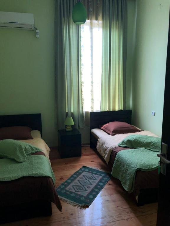 Двухместный (Бюджетный двухместный номер с 2 отдельными кроватями) гостевого дома La Deka, Лагодехи