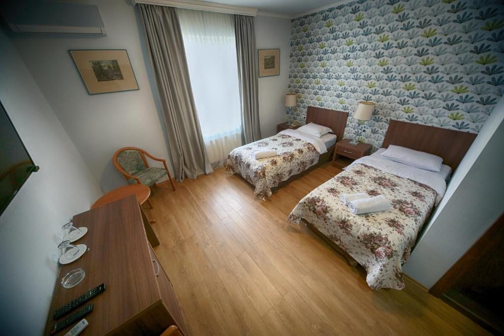 Двухместный (Стандартный двухместный номер с 1 кроватью или 2 отдельными кроватями) отеля Мартвили