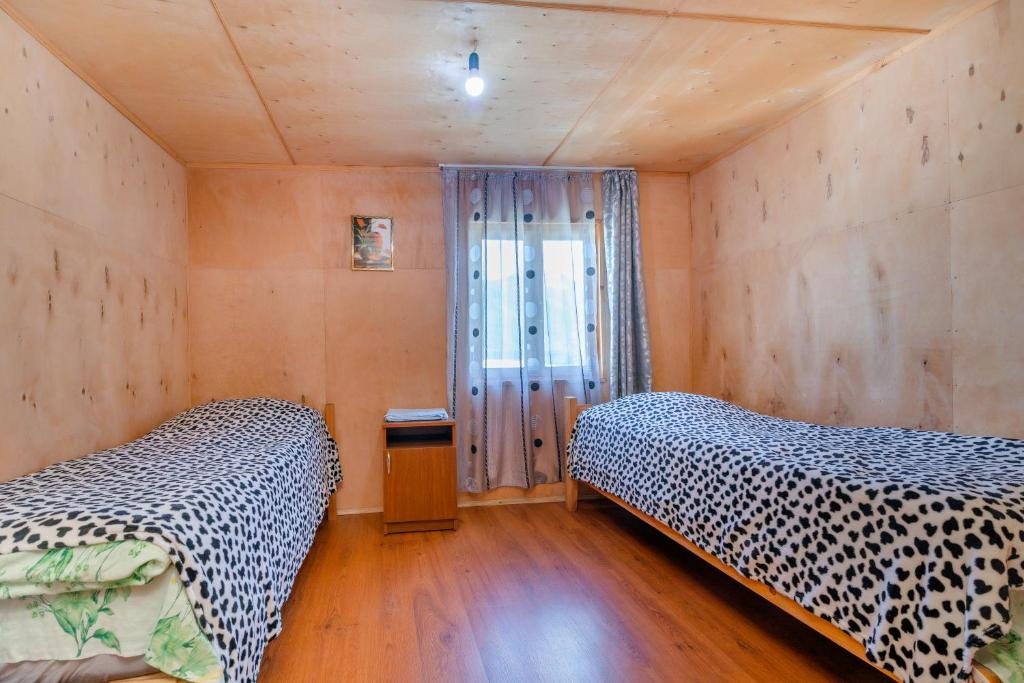 Двухместный (Двухместный номер с 2 отдельными кроватями) гостевого дома Старый Омало