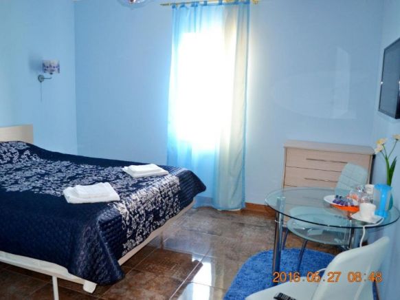 Фотография номера гостевого дома На Лугу