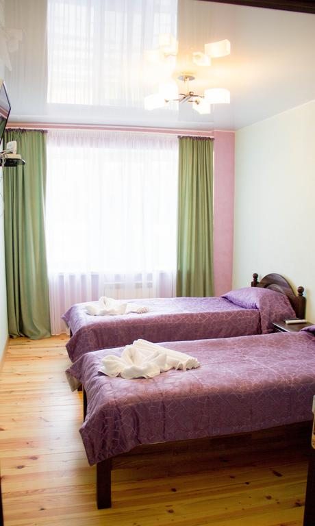 Семейный (Семейный номер с общей ванной комнатой) отеля Теннис в Солнечном, Раков