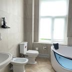 Ванная комната в номере категории «сюит»