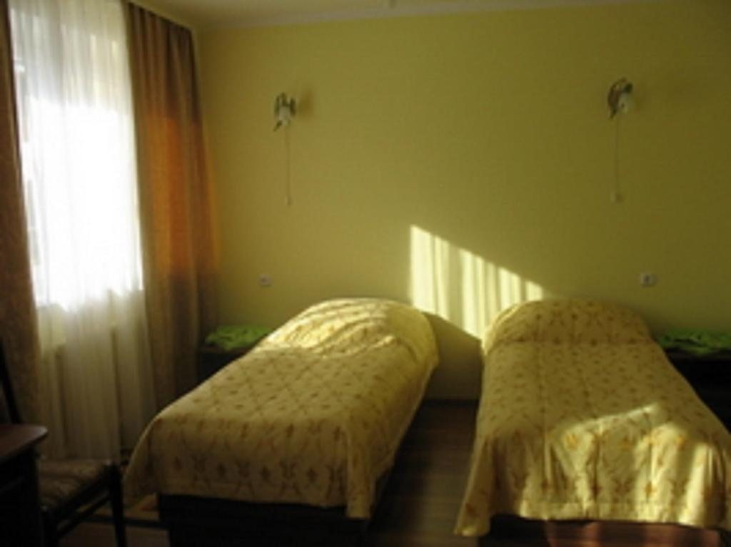 Двухместный (Двухместный номер с 2 отдельными кроватями - Подходит для гостей с ограниченными физическими возможностями) отеля Лида