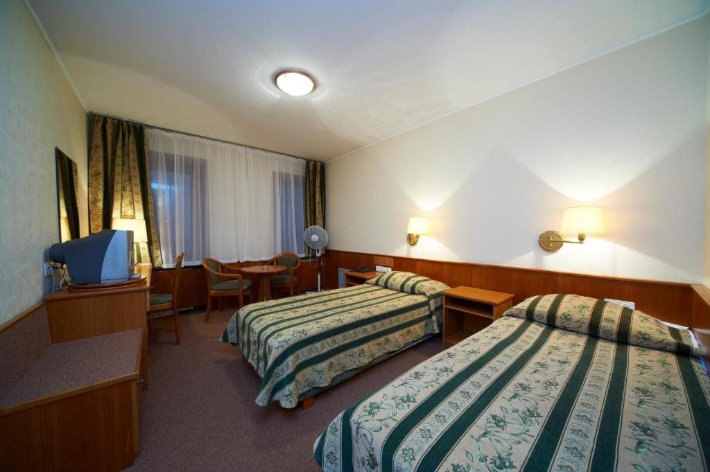Двухместный (Стандартный двухместный номер с 2 отдельными кроватями) отеля Нептун, Санкт-Петербург
