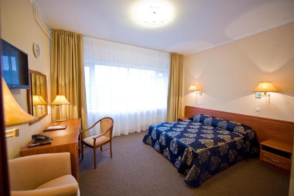 Двухместный (Улучшенный двухместный номер с 1 кроватью или 2 отдельными кроватями) отеля Нептун, Санкт-Петербург