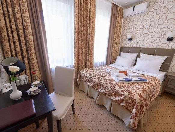 Фотография номера апарт отеля Тучков