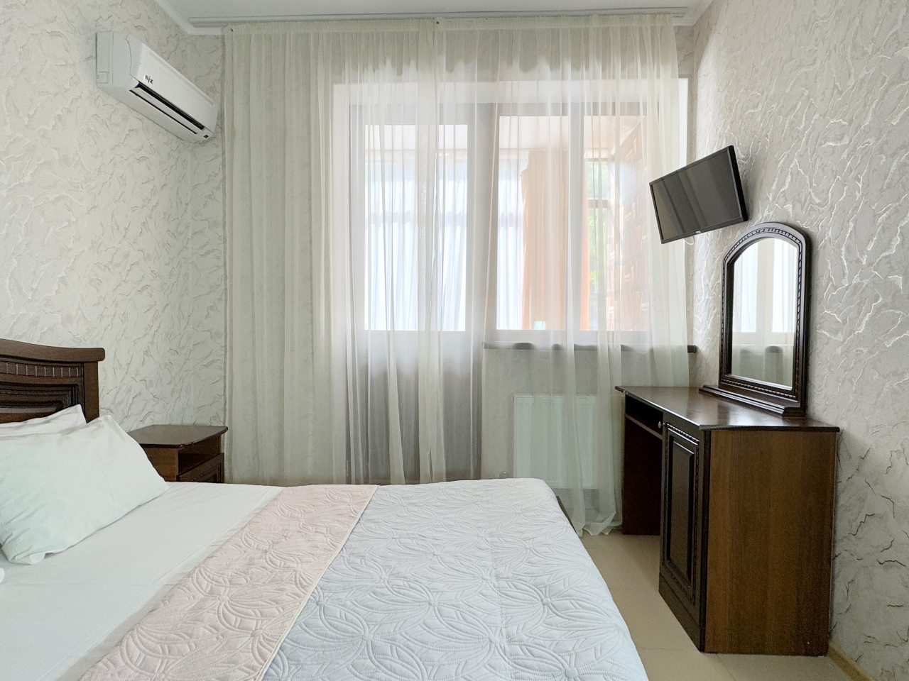 4-местный Комфорт плюс с видом на бассейн