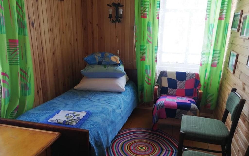 Двухместный (Двухместный номер с 2 отдельными кроватями, вид на сад) загородного отеля Налибокские васильки, Белокорец