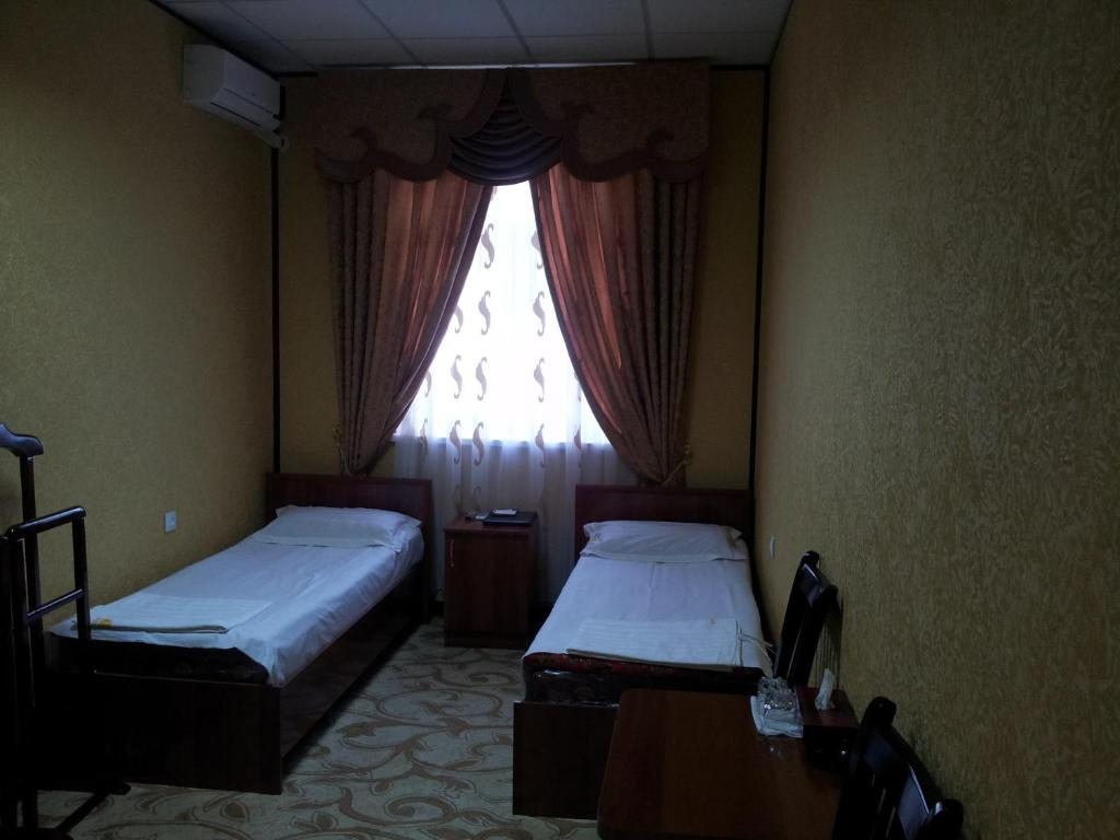 Двухместный (Стандартный двухместный номер с 2 отдельными кроватями) отеля Дангара, Коканд