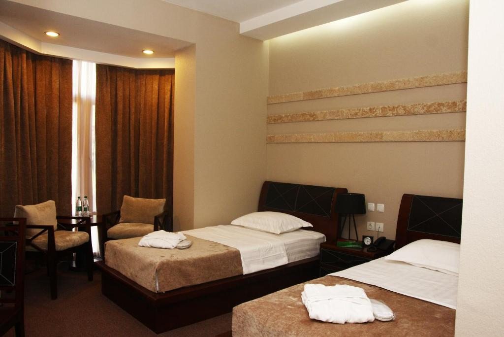 Двухместный (Двухместный номер с 2 отдельными кроватями) отеля Grand M, Навои