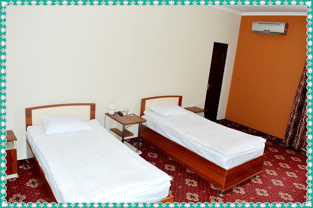 Двухместный (Бюджетный двухместный номер с 2 отдельными кроватями) отеля Arkanchi, Хива