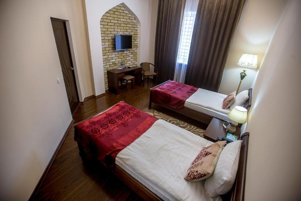 Двухместный (Стандартный двухместный номер с 2 отдельными кроватями) отеля Arkanchi, Хива