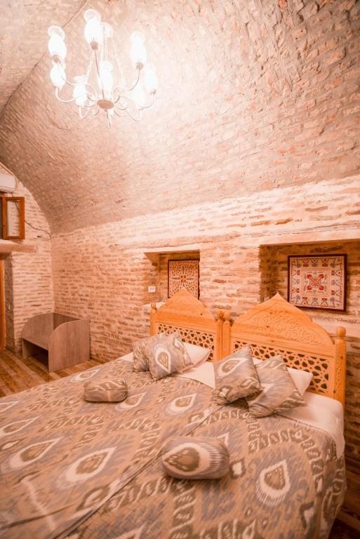 Двухместный (Большой двухместный номер с 1 кроватью или 2 отдельными кроватями) хостела Минфиза, Бухара