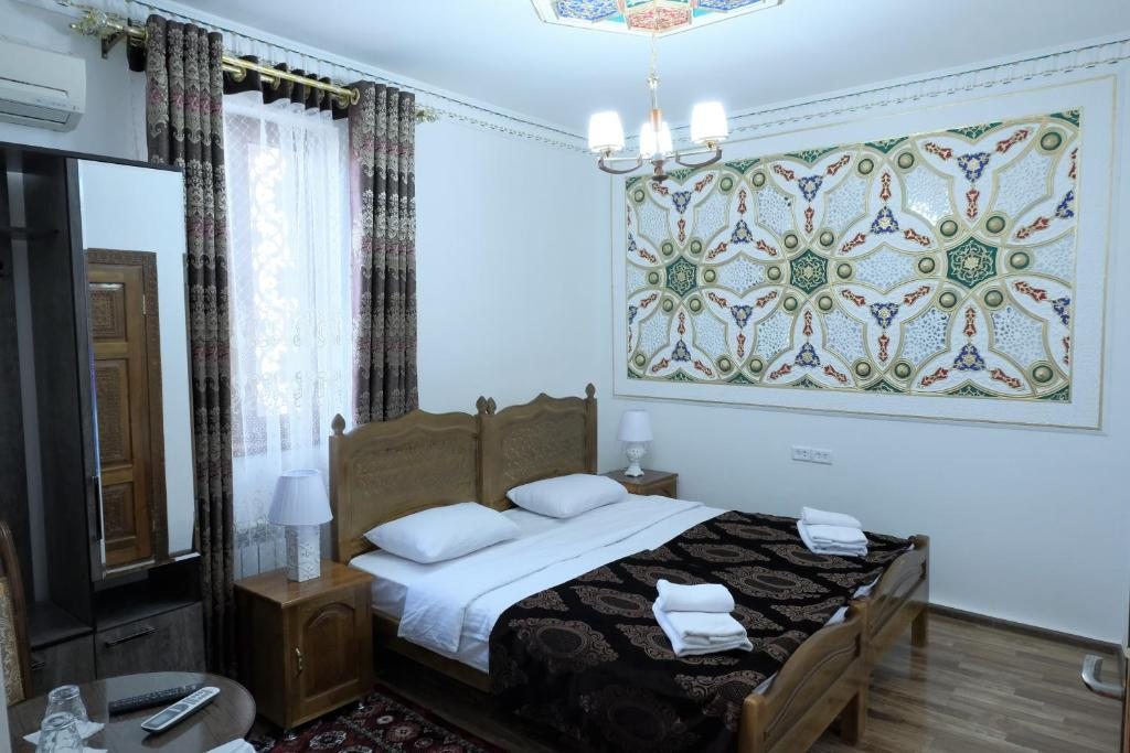 Двухместный (Двухместный номер Делюкс с 1 кроватью) отеля Бухара Барака