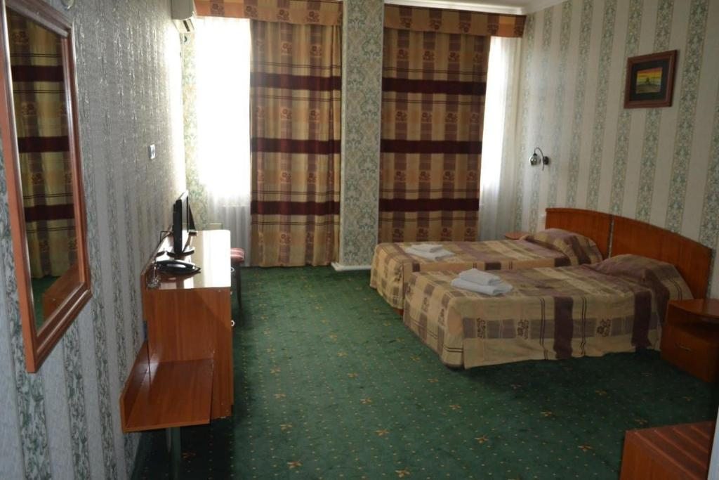 Двухместный (Стандартный двухместный номер с 2 отдельными кроватями) отеля Hayat Inn Khiva, Хива