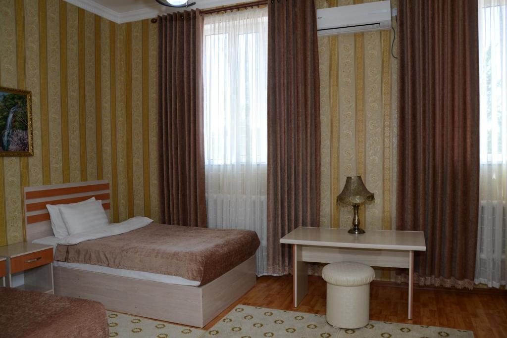Двухместный (Двухместный номер с 2 отдельными кроватями и душем) отеля Асем, Нукус